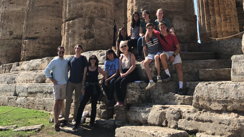 Dartmouth students in front of Roman archeological site